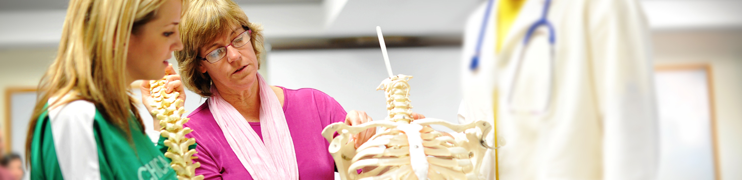 Students in lecture hall talking